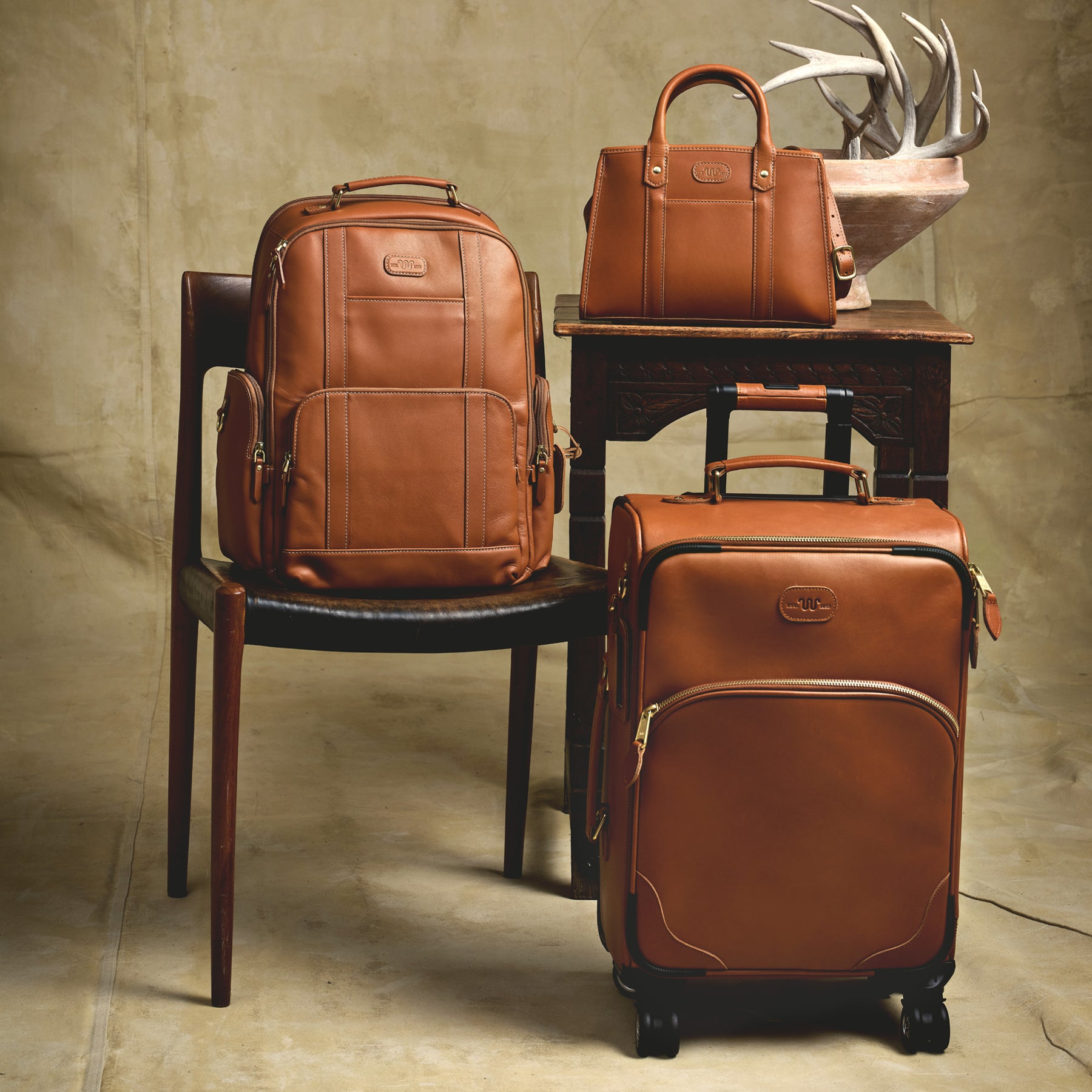 Leather rolling luggage hotsell